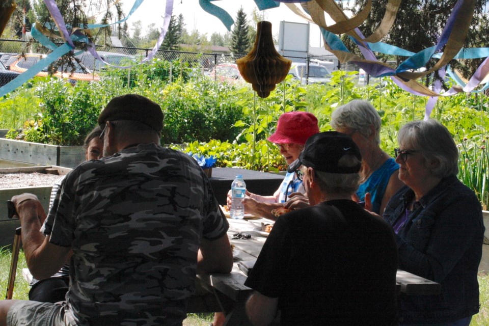 Greenwood Neighbourhood Place Society hosted on Wednesday, Aug. 6 a pizza party at the Sundre Community Garden for current and past plot holders to celebrate the garden’s 10th anniversary. 
Simon Ducatel/MVP Staff