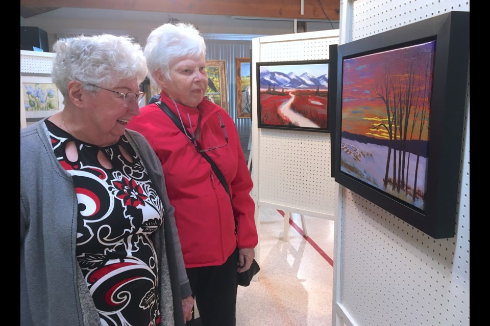 Pat Campkin, left, from Sundre, and Alice Andras, who lives in the area, were among more than 200 people who came out to the Sundre West Country Centre over the weekend of April 30 and May 1 for the return of the Sundre Creative Arts group’s showcase and sale. 
Simon Ducatel/MVP Staff