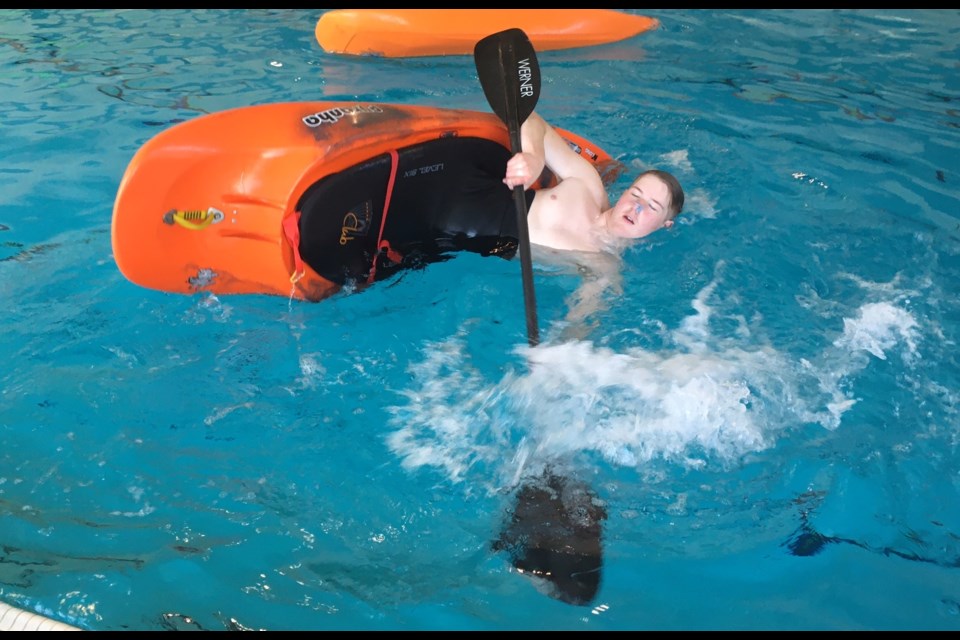 Liam McElhinney, 16, was among more than half a dozen members of the Sundre Paddling Club who came out to the Sundre Aquaplex on Friday, March 31 to practise kayaking skills under the controlled conditions provided by an indoor pool. This particular manoeuvre is known as a sculling brace, which helps a kayaker to develop and improve paddle dexterity along with a greater understanding of how to use the paddle to get steady support.
Simon Ducatel/MVP Staff