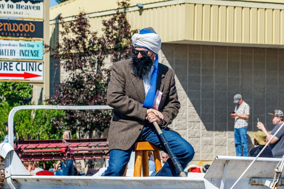 An entry in the Sundre Pro Rodeo Parade featuring a man donning a turban and a fake beard riding a manure spreader labelled "The Liberal" has gone viral. Committee organizers said the entry was not approved. 
Photo courtesy of Image by Maila