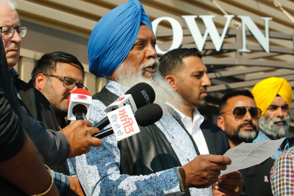 Surinder Randev, president of the 5AB Riders Club, addresses the gathering in front of Sundre’s municipal office on Sept. 10 during the inaugural Sikh Motorcycle Ride for Unity and Love for Humanity. Also attending was a delegation of representatives from the Dashmesh Culture Centre in Calgary. The non-profit organizations donated a total of $22,000 to the Sundre Greenwood Neighbourhood Place Society as well as the Plus 1 Emergency Food Hamper Service, which each received $11,000. “Both of these organizations are doing phenomenal work to support the town of Sundre,” said Randev. “We are excited to contribute towards their causes.”
Simon Ducatel/MVP Staff