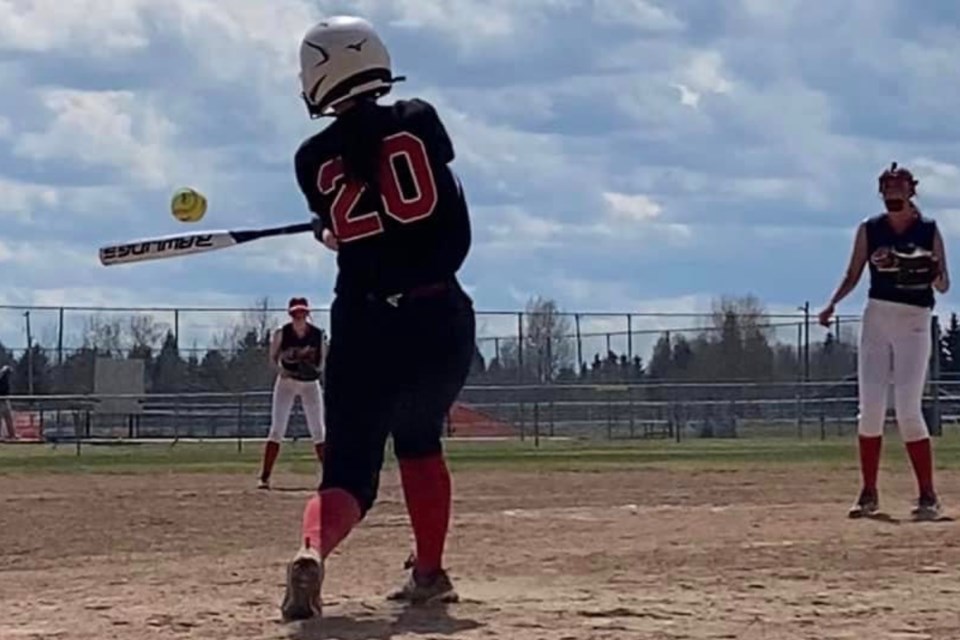 Emma Hicks, who plays with the Sundre U17 Stealers fast-pitch softball squad, connects with the ball during a game earlier this season. 
Submitted photo