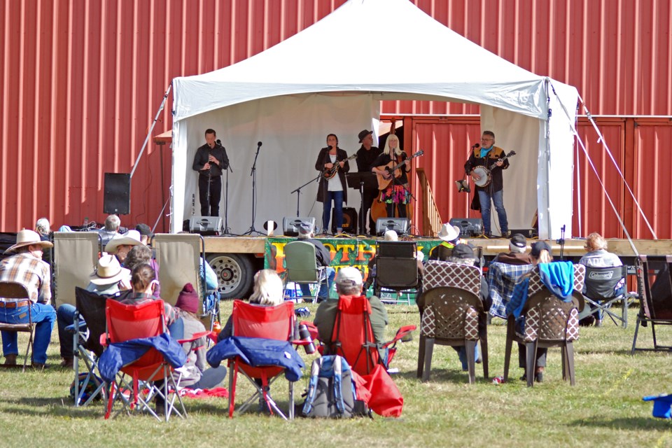 The Buggs were among six bluegrass bands to perform on Saturday, Sept. 26 during the Taste of Shady Grove outdoor music festival. People brought some lawn chairs to enjoy the event at the at the Sundre Rodeo Grounds, which accommodated a drive-in area behind a field that was sectioned off in squares that physically distanced cohorts who came out. Organizers with the Foothills Bluegrass Music Society look forward to next year, when they plan to return to Sundre to host the 30th annual, three-day Shady Grove Bluegrass Festival.
Simon Ducatel/MVP Staff