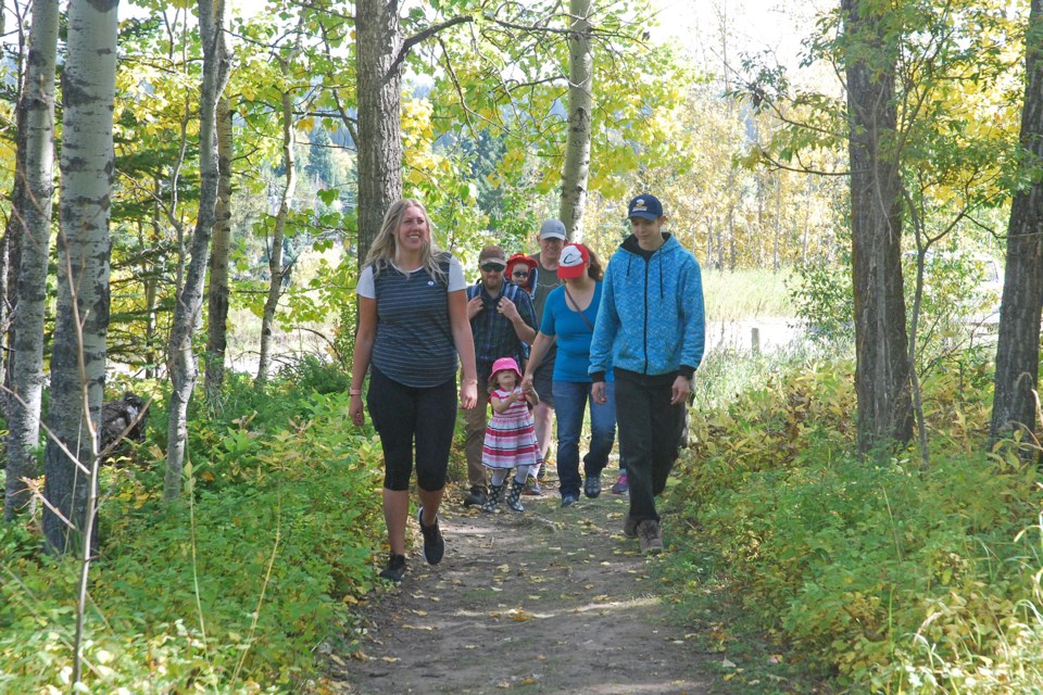 The Newton family — Chris, Valerie and daughter Taya, front and left — were joined by friend Erik Nielsen as well as Sundre newcomers the Elliotts — Adam, Meg, and children Chandler, 1, Beth, 3, and Gage, 16, front and right — on Sunday afternoon at Snake Hill to participate in the 40th annual Marathon of Hope Terry Fox Run. 
Simon Ducatel/MVP Staff