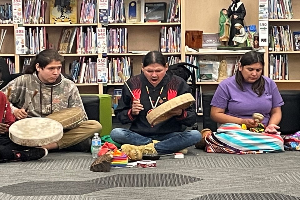 Indigenous knowledge keeper Dean Allen Johnson leads a traditional song before the teepee raising event at Innisfail's St. Marguerite Bourgeoys Catholic School on June 17. Johnnie Bachusky/MVP Staff