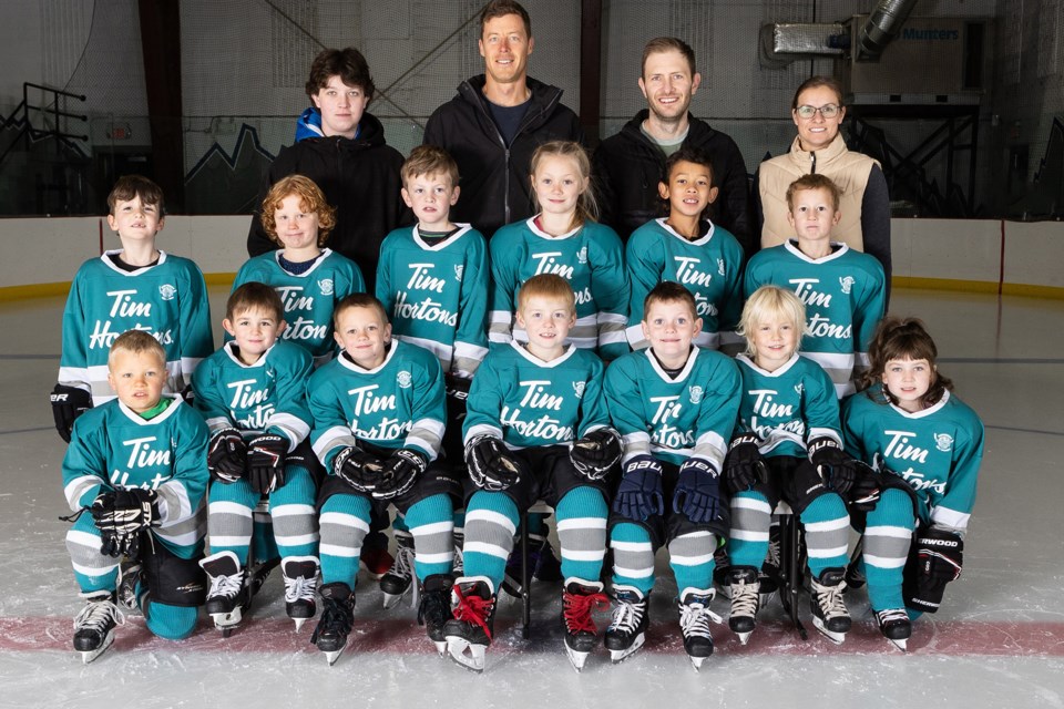 U8 TEAM 1 -  Back row:  Jr. Ccach Teegan Gross, head coach Andrew Block, asst. coach Brock Reimer and manager Kacie Adams. Middle row: Landon Minnes, Abraham Lehman, Jay Reimer, Myra Algra, Asher Price and James Gunn. Front row: Cache Block, Hudson Boody, Lincoln Hayes, Ryder Adams, Emmett Adams, Finnlee Shute and Charleigh Gross.
