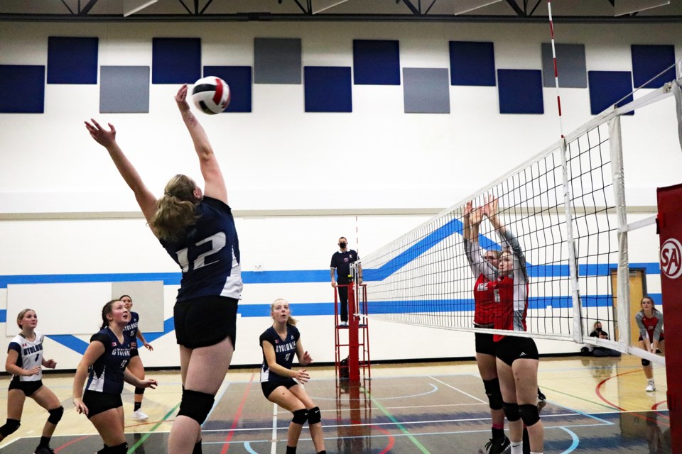 Innisfail's Emma Osmond drives a shot against the St. Joseph Falcons during thrilling semifinal action at the at the Innisfail Cyclone's Senior Girl's Volleyball Tournament on Oct. 16. The Falcons went on to win the semifinals two games to one. Johnnie Bachusky/MVP Staff