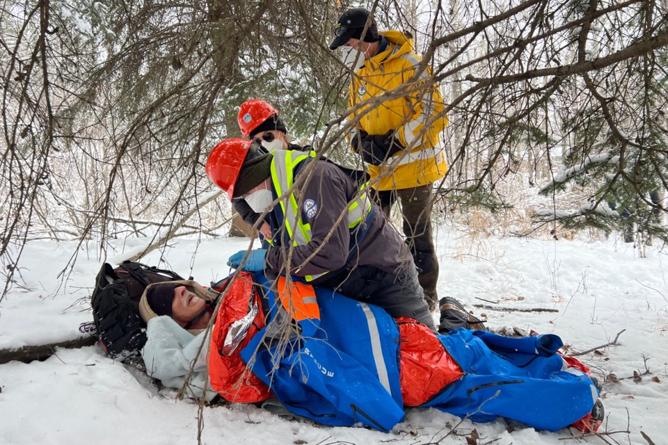 A multi-agency, three-day training exercise featuring a mock wildfire that threatened Cochrane included “a few twists and turns” such as a homeless encampment where dozens of actors played the roles of people who had suffered a variety of injuries after being caught off-guard by the fast-spreading blaze, said Roger Tetreault, senior search manager with the Sundre Search and Rescue Association. 
Submitted photo