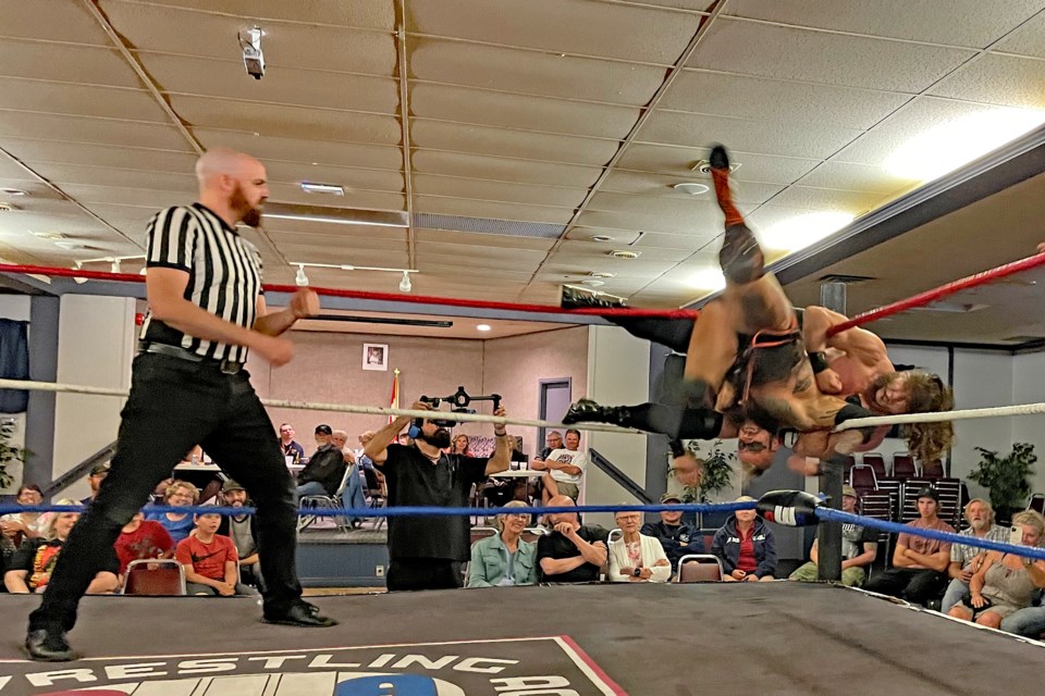Wrestling action at the Royal Canadian Legion Branch #104 gets tight and twisted in the corner. Johnnie Bachusky/MVP Staff