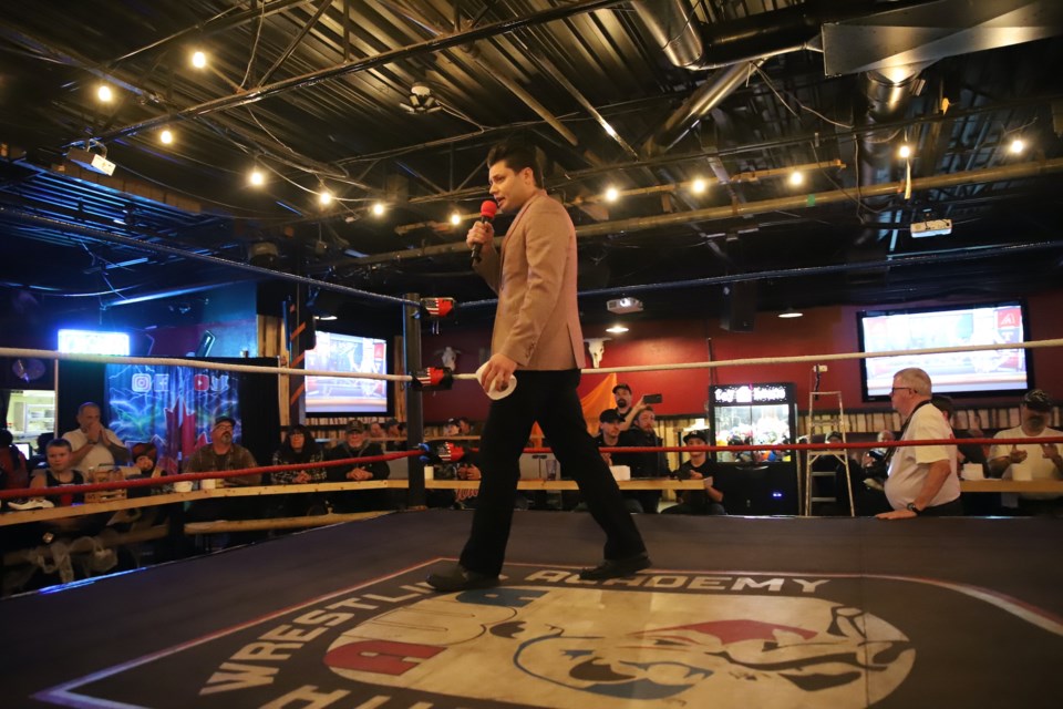 Logan James addressed the crowd at the beginning of the evening, calling down his eventual opponent, Andy Anderson for insulting Olds residents. He gave toilet paper rolls to people who'd bought ticket from him and urged them to throw them at Anderson when he came into the ring — which they did.