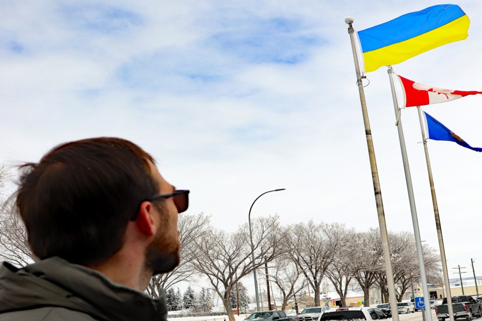 Yan Omelyanchuk, a 29-year-old project manager for Innisfail's Bilton Welding and Manufacturing Ltd., dropped by the town's administration building on March 4 to honour the raising of the Ukrainian flag. Johnnie Bachusky/MVP Staff