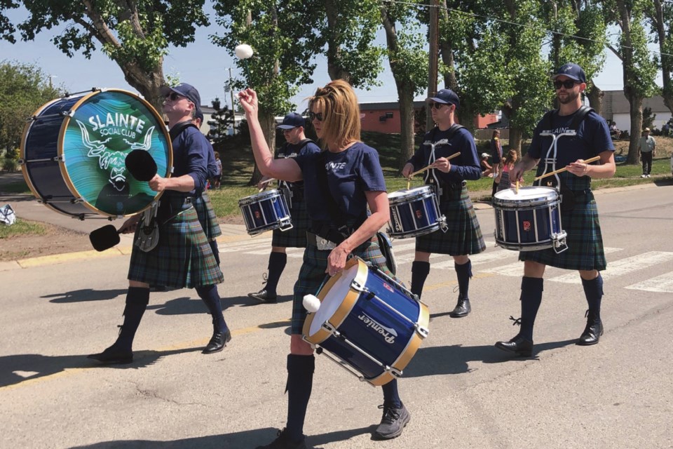 The Slainte Social Club band drummers march towards Memorial Park during Sunday's parade.
Dan Singleton/MVP Staff