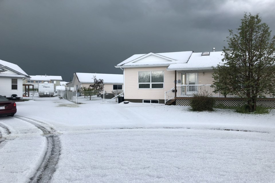 Hail blankets the ground on 44th Avenue Close in Innisfail on July 12 after a storm swept through. Photo by Marlowe Harrowby
Photo by Marlowe Harrowby
