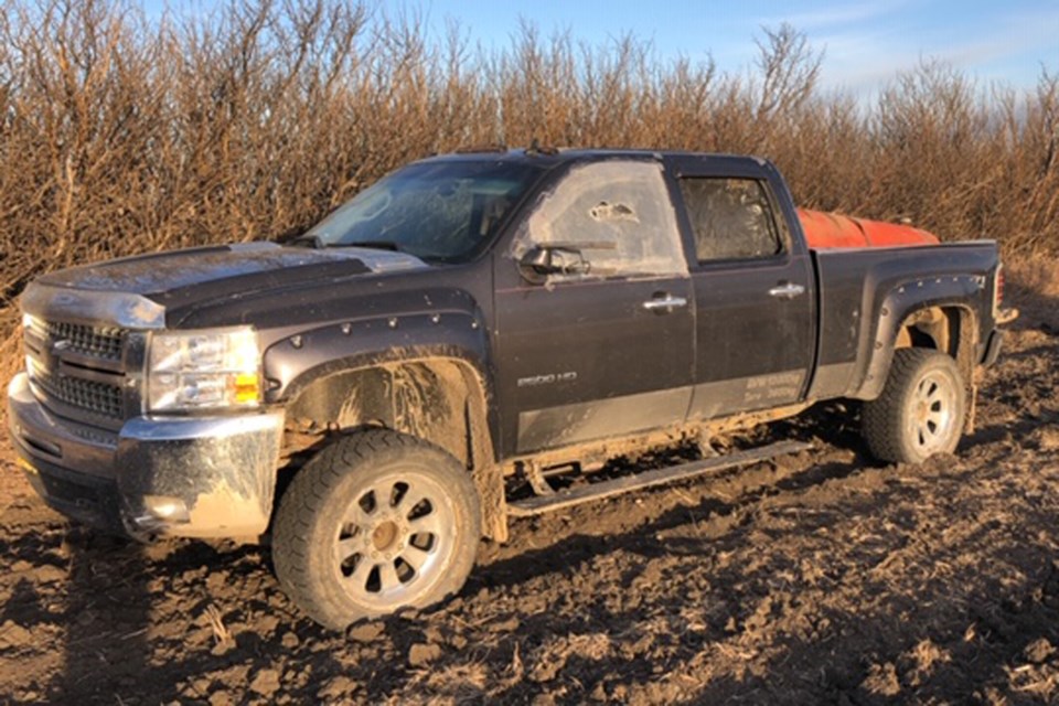 An ongoing investigation being conducted by the RCMP's Southern Alberta District Crime Reduction Team resulted in a search warrant being executed in Cardon, northeast of Calgary, where numerous trucks were among a large haul of recovered stolen property. Two suspects have been charged, and police continue to look for a third who could be armed.
Photos courtesy of RCMP