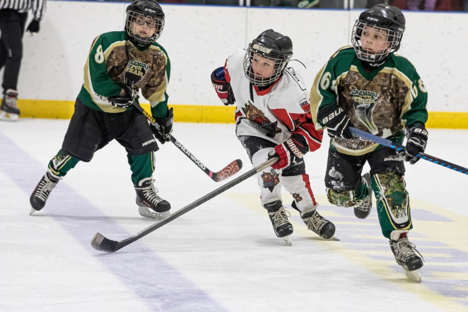 Ben Petersen, a player with the Sundre Fun Team Rec Hockey League tier 2 squad, skates up the ice looking for an opportunity to take possession of the puck during the team's game against Cremona on Friday, Feb. 7. The match was part of the league's annual tournament.
Photo courtesy of Image by Maila
