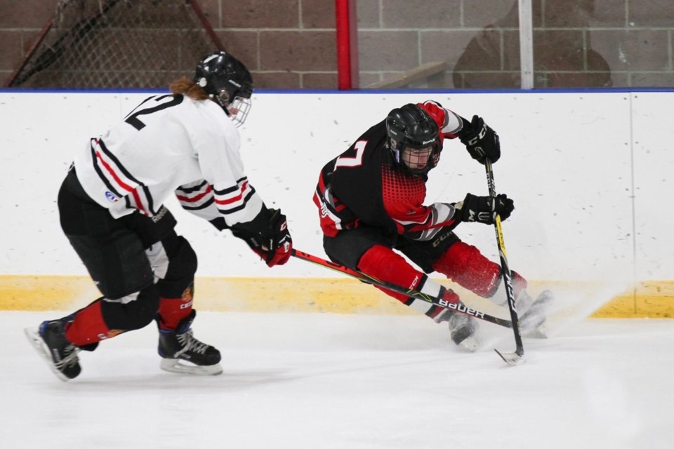 Thomas Robertson hits the brakes on Feb. 7 at the Trochu Arena during a game against Kneehill, who ended up winning 9-2.
Photo courtesy of Cheryl Craig Photography