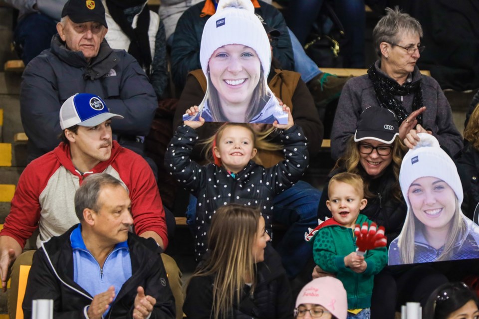 From left, Team Rocque second Becca Hebert's husband Jordan Hebert, cousins Sloane Hebert and Griff Hebert, and mother-in-law Shelly Hebert form a Rocque cheering section during the semifinal of the 2020 Alberta Scotties in Okotoks at Murray Arena on Jan. 26. 
Brent Calver/Okotoks Western Wheel