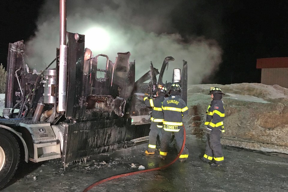 The driver of this truck, which was totalled, escaped unharmed after waking up in the middle of the night to smoke billowing from the dashboard on Friday, Jan 10. 
Photo courtesy of Sundre Fire Department