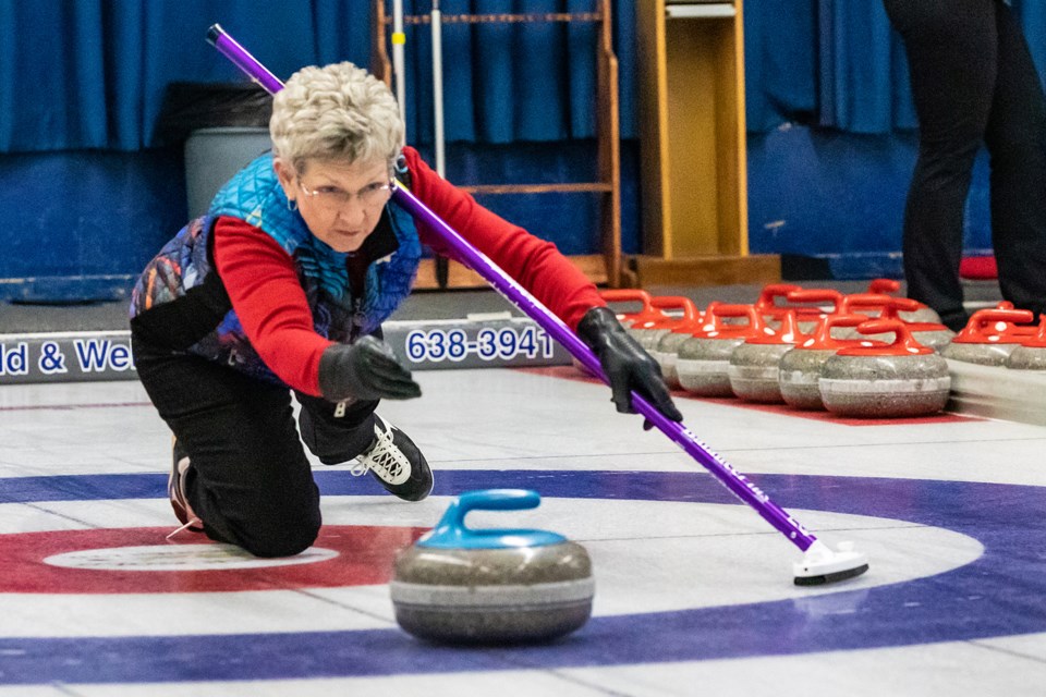 Terry Nelson demonstrates good form as she releases a rock on Friday, Feb. 7 during the Sundre Curling Club's annual women's bonspiel. The event brought out 20 teams, with players coming from the Calgary and Cochrane areas as well as Cremona, Olds and Sundre. 
Photo courtesy of Image by Maila