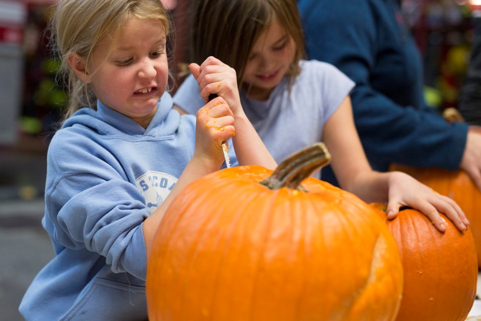 Skylur Robertson carves on Wednesday, Oct. 30 a pumpkin during the Sundre Fire Department's annual family pumpkin carving event at the fire hall. 
Noel West/MVP Staff