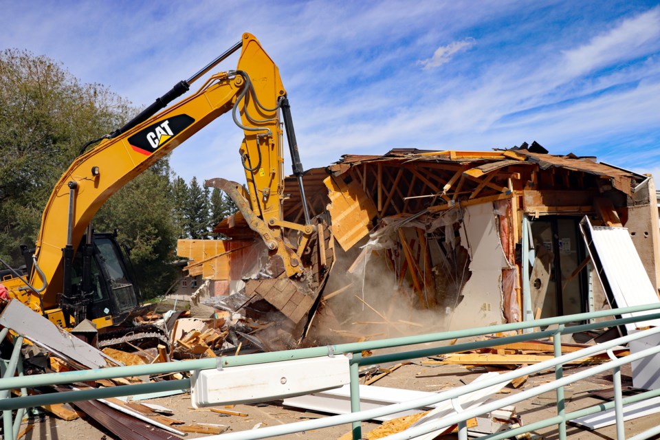 Demolition for the old Autumn Glen Lodge for seniors began in the morning of Aug. 31. The 59-year-old structure, along with adjacent Poplar Grove Court, will be fully demolished by the third week of October to make way for new development. Johnnie Bachusky/MVP Staff