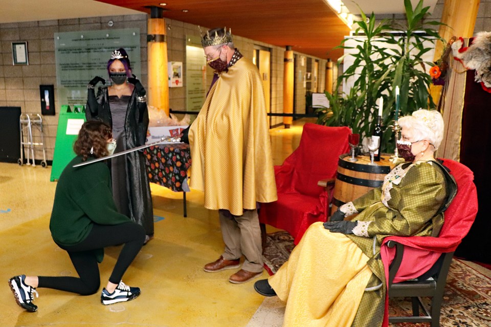 Trick-or-treaters get knighted at the royalty station during the Halloween Hop celebration on Oct. 24 at the Innisfail Library/Learning Centre. Johnnie Bachusky/MVP Staff