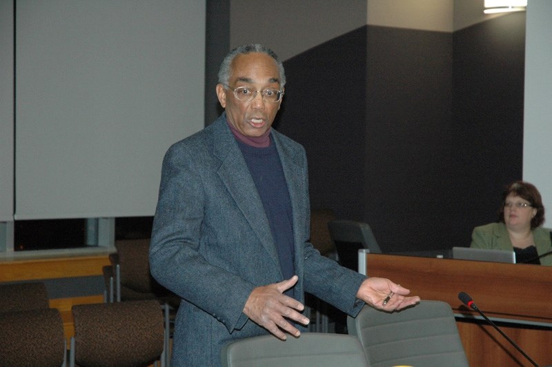 Anton Walker, a member of the Sustainable Sundre Committee, speaks with town councillors.