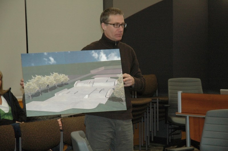 Sundre Skatepark Project Committee member Bill Lough holds a drawing of a skatepark during a presentation to council last week.