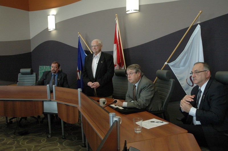 Rocky-Sundre MLA Ty Lund, centre, speaks with guests at last week&#8217;s government ministers visit to the town office. Ministers Snelgrove, Renner and Gourdreau as seated