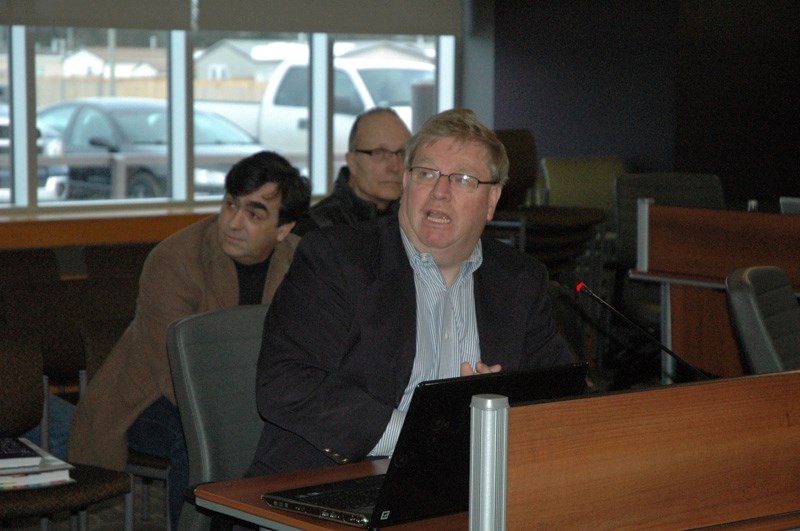 Hunter speaks with town councillors during last week&#8217;s governance committee meeting.