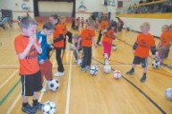 Sundre youngsters practice soccer last week.