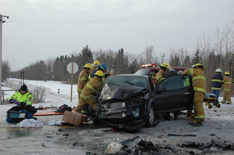 Crews help injured in Sundre crash