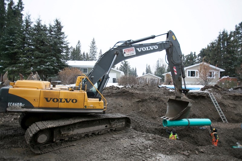 Construction continues on the east side water and waste water service lines along 1st Avenue N.E.