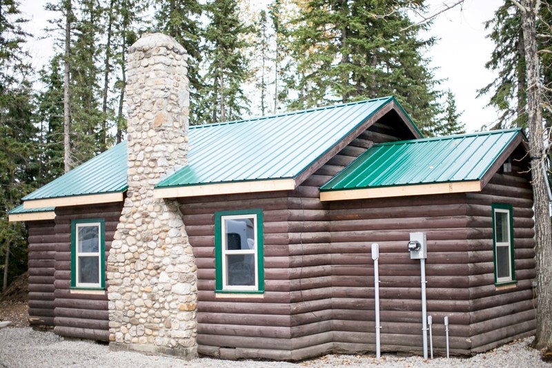 The historic log cabin near the bank of the Red Deer River is the centrepiece of the development plan at Country Road RV.