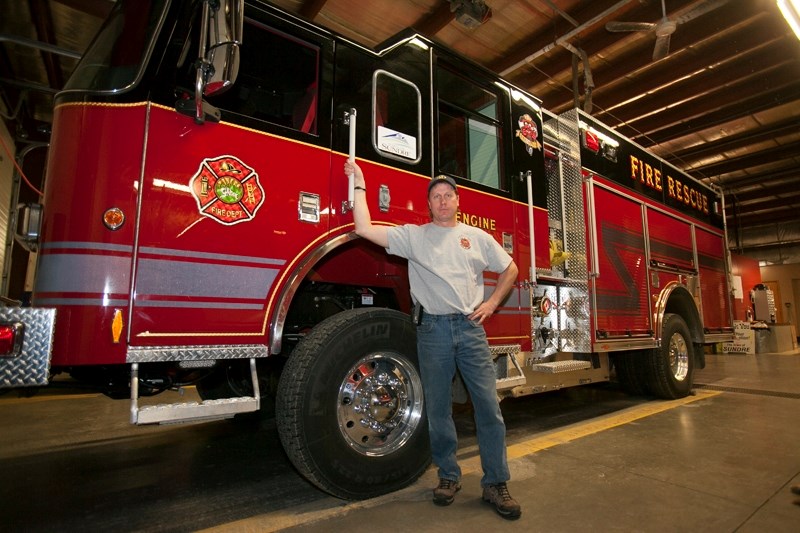Fire Chief Marty Butts with the new $400
