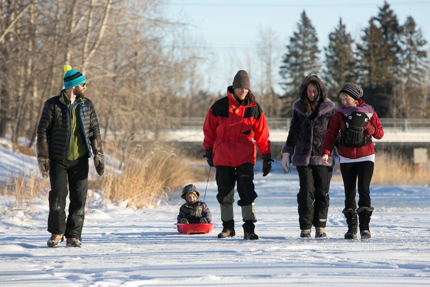 A WINTER WALK ó Cold weather isn&#8217;t enough to discourage Sundre residents from going outside on a sunny day. From left, Paul Shippy, Orion, Sunny and Audrya Chancellor