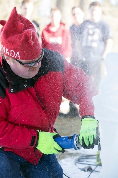Gregory McMartin works on an ice sculpture on the grounds of the Sundre Museum during the 11th annual Winterfest, held Saturday and Sunday, Feb. 13-14.,