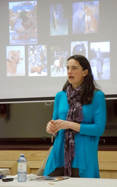 Chiara Fedes, a Fish and Wildlife biologist based out of Rocky Mountain House, addresses on Wednesday, Feb. 17 about two dozen people regarding some wildlife management