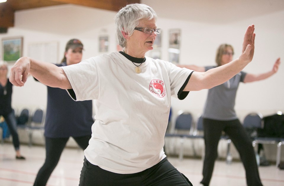 TAI CHI AN EXERCISE FOR THE MIND AND BODY ó Linda Martin leads some students in a Tai Chi class at the West Country Centre on Monday, Feb. 8.,