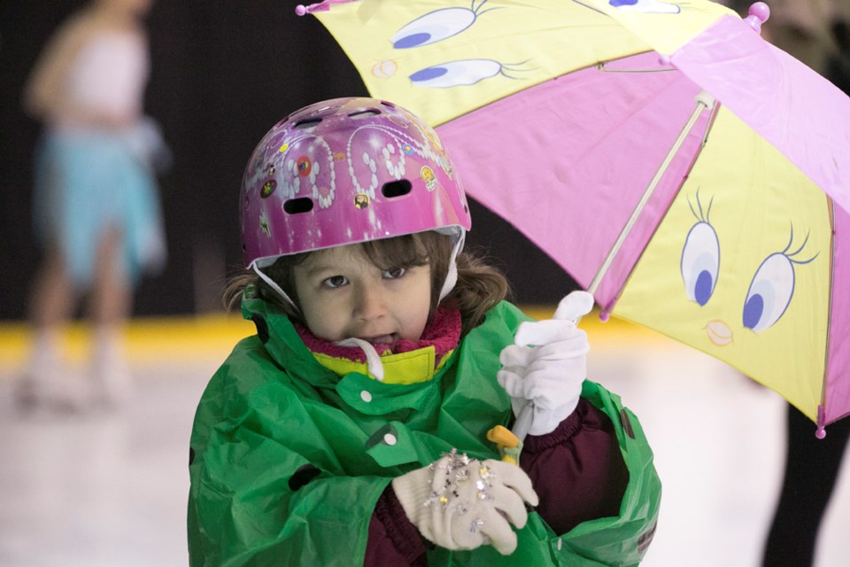 IT&#8217;S A WONDERFUL WORLD ó A skater circles the rink during the grand finale of the Sundre Skating Club&#8217;s Strut Your Stuff annual ice carnival at the Sundre Arena