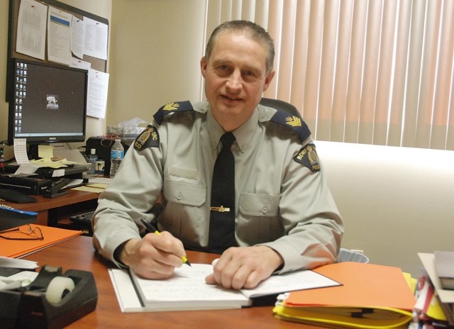 Sgt. Jim Lank, pictured here in a file photo at the Sundre RCMP detachment, recently outlined the annual performance plan to town council. He noted that property crimes had