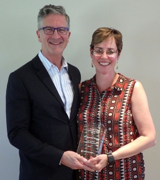 Sundre&#8217;s own Dr. Michelle Warren was recently named the 2015 recipient of the Dr. Hal Irvine Community Focus Award. Presenting her with a plaque during a ceremony held