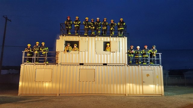 Sundre&#8217;s volunteer firefighters have a new training facility — pictured here last week with members of the department at a temporary location near the town office until 