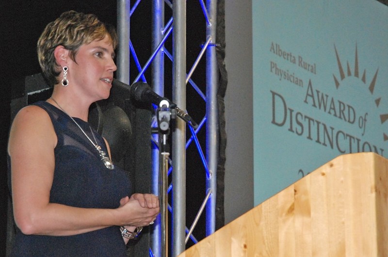 Sundre&#8217;s Dr. Michelle Warren, who was recently presented with the Alberta Rural Physician Award of Distinction, addresses a large crowd of more than 200 who attended
