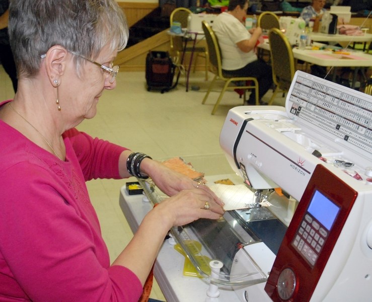 Darlene Gulka, who founded the Victoria&#8217;s Quilts Canada Sundre Chapter 28 about five years ago, was among 20 seamstresses who got together at the local legion on