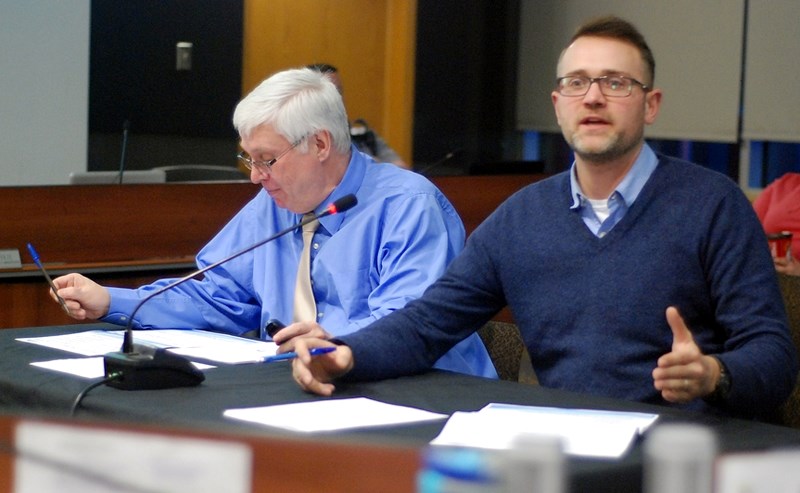 Jon Allan, economic development officer, right, and Vic Pirie, director of finance and administration, presented council with a detailed report during its Feb. 21 workshop on 