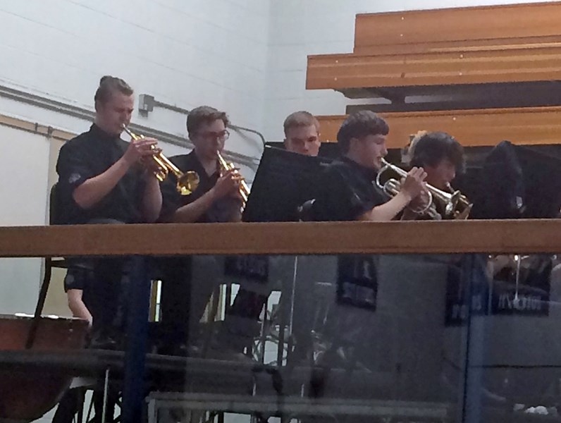 Members of the Sundre High School concert band perform during a well-attended dinner fundraiser at the school&#8217;s gym on Friday, Feb. 17.