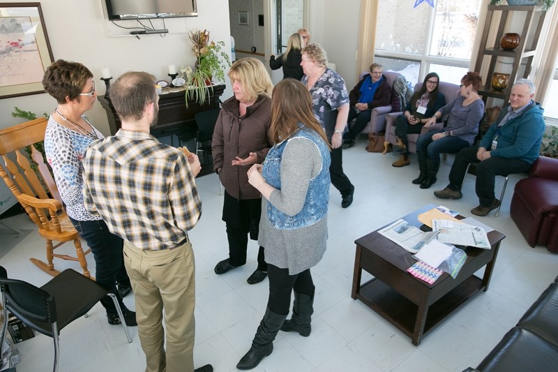 People mingle at the Sundre Hospital and Care Centre on March 7 during the inaugural Sundre Hospital Appreciation Day. Heidi Overguard asked council last month to consider