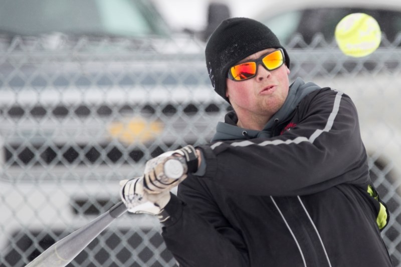 Sundre River Rats player Brant Blackhurst stares down the ball while up at bat during the River Rats&#8217; game against the Mustard Tigers at O.R. Hedges Park in Olds on