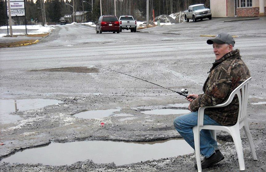 Sundre resident Lyle Gorsline was setting up a chair with a fishing rod and was about to take a photo when someone crossing Main Avenue at Third Street offered to take his